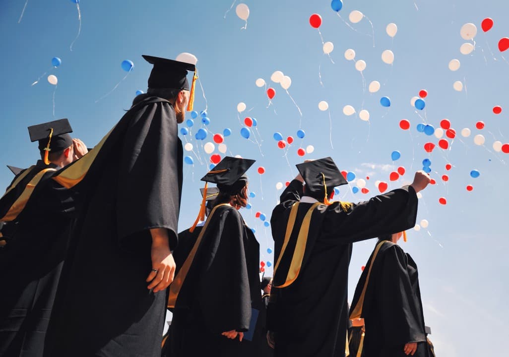 Graduates at a university commencement ceremony